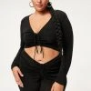 GOOD AMERICAN SHINE RUCHED CROP TOP | BLACK001